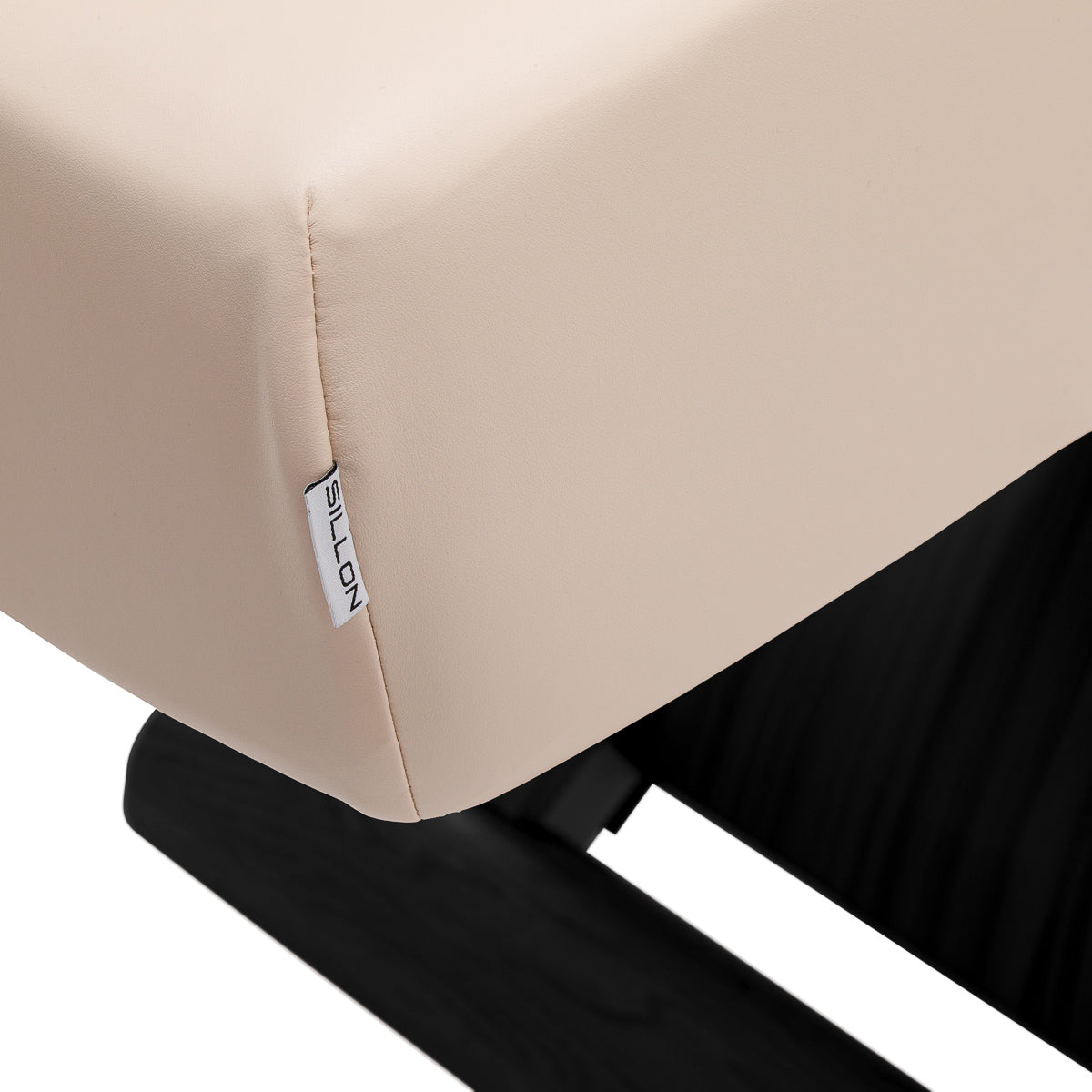 Cream SPA lounger Sillon Siesta with black base, comfortable beauty salon furniture for relaxation and professional use.
