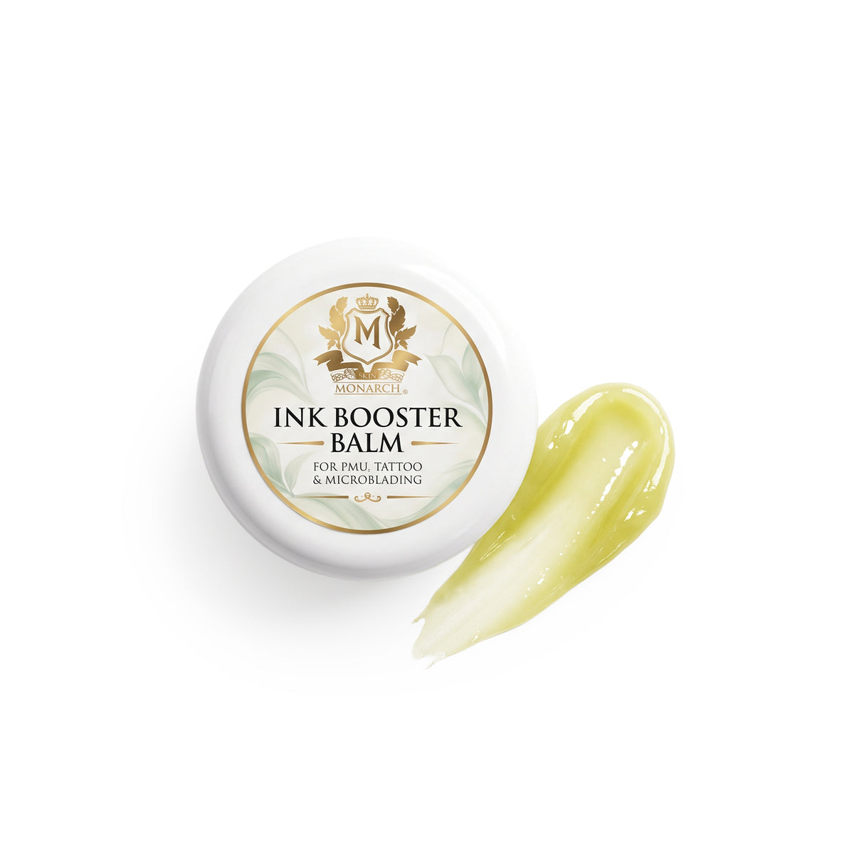 Skin Monarch Ink Booster Balm 30ml, coperchio accanto a una striscia di balsamo giallo lucido