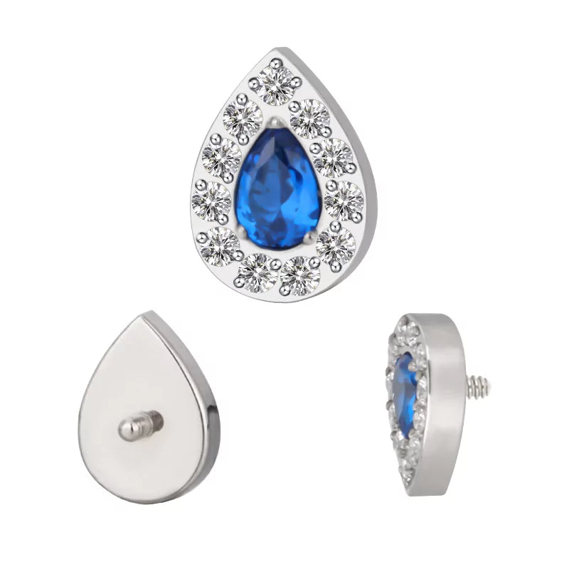 Anello in titanio con pavé a forma di pera