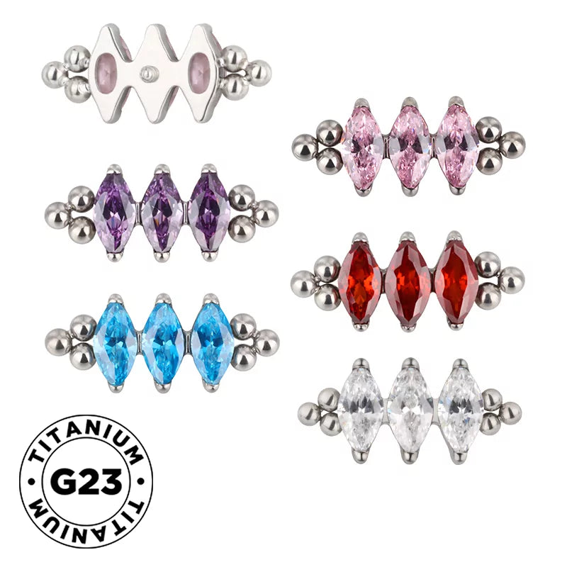 Anello in titanio con tre perline e castone