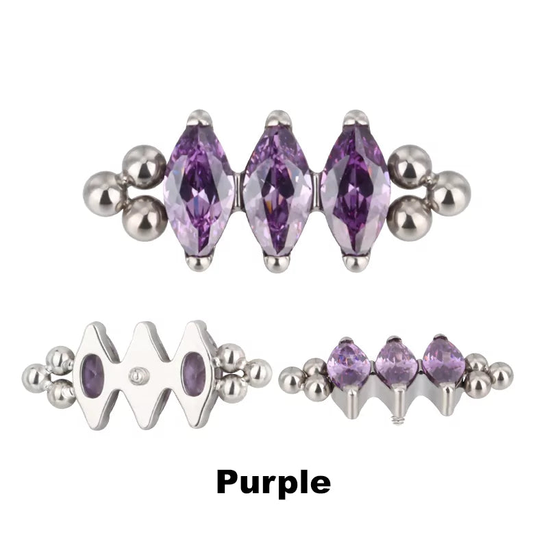 Anello in titanio con tre perline e castone