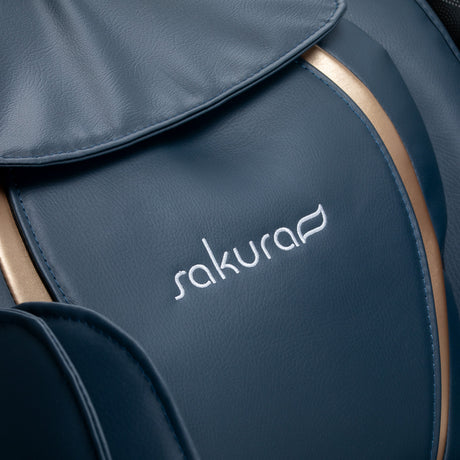 Sakura 3D Sakura Maximus 809 massage chair in grey-blue with padded armrests and ergonomic design for full-body relaxation.