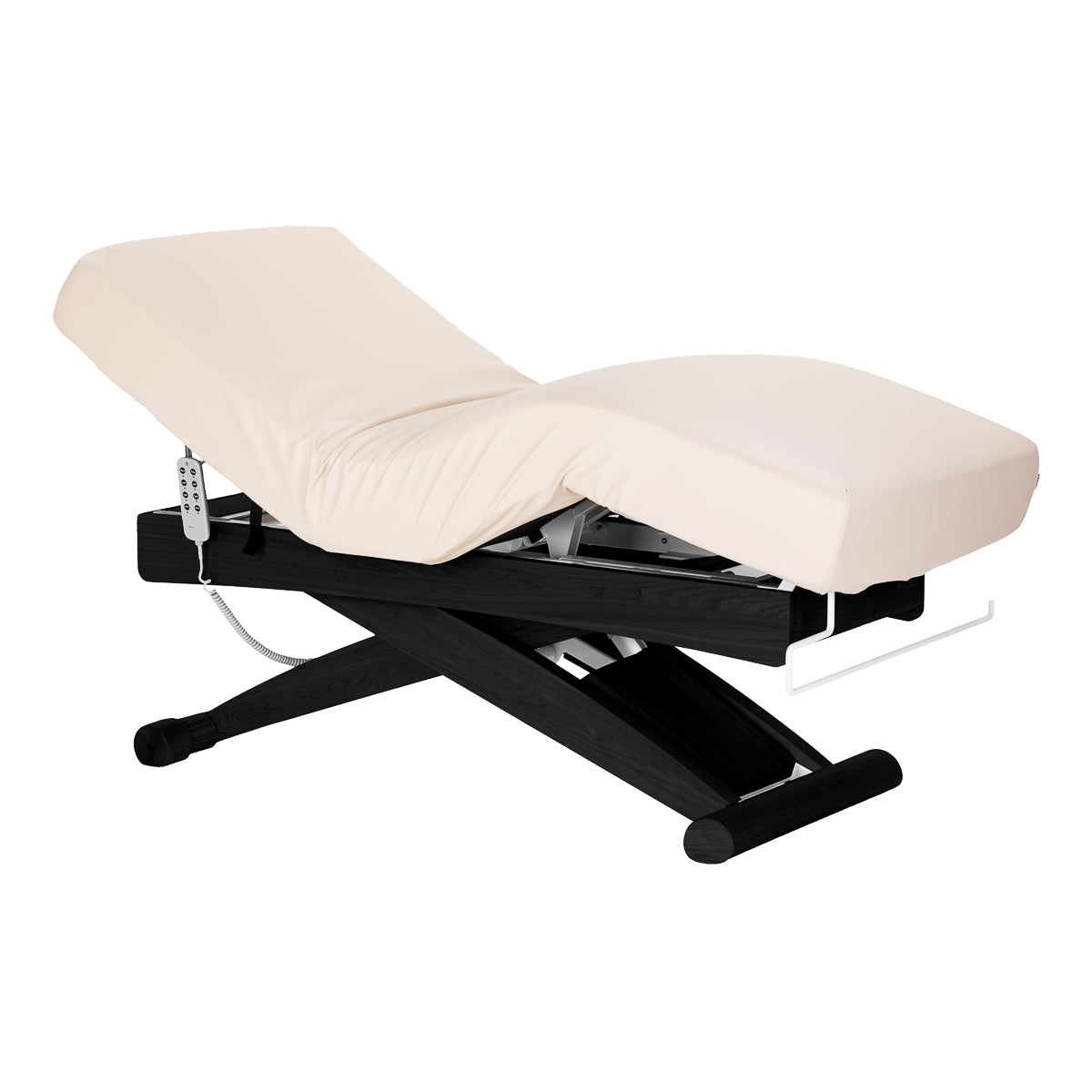 Cream SPA lounger Sillon Siesta with black base, beauty salon furniture for comfortable client seating and relaxation.