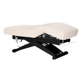 Cream SPA lounger Sillon Siesta with black base, ideal for beauty salon furniture, featuring plush cushioning and sleek design.