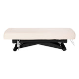 Cream SPA lounger Sillon Siesta with black base, comfortable beauty salon furniture for relaxation and professional use.
