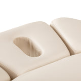 Cream SPA lounger Sillon Relax with black base for beauty salon furniture, featuring cushioned seating and sleek design.