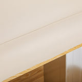 Cream-colored SPA lounger Sillon Comfort with light brown base, ideal for beauty salon furniture and relaxation.