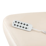 Cream-colored SPA lounger Sillon Comfort with light brown base, designed for beauty salon furniture, showcasing a comfortable reclining chair.