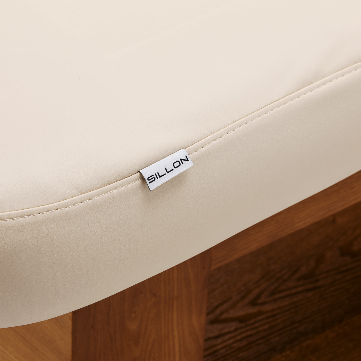 Luxury SPA lounger Sillon Leisure from SILLON, a stylish beauty salon furniture piece with adjustable headrest and plush upholstery.