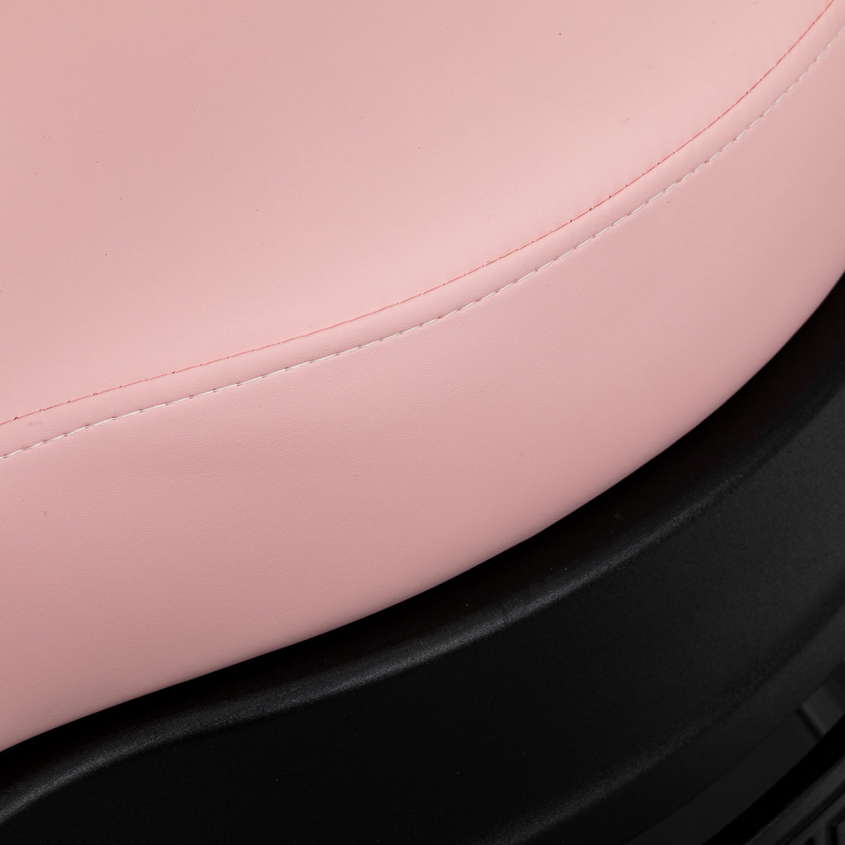 Pink Barber Chair Gabbiano President with black base and cushioned seat, adjustable backrest, and armrests for salon use.