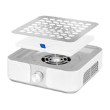 White and silver MOMO Dust Absorber P30 60W with sleek design and adjustable filter in a modern kitchen setting.