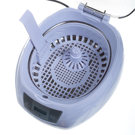 Ultrasonic cleaner 750 ml by Beauty System, compact device with stainless steel tank for jewelry and small item cleaning.
