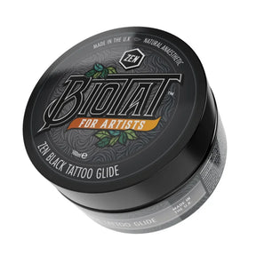 Biotat Zen Black Tattoo Glide 100g jar showing black tattoo lubricant with label and open lid, used for tattooing.