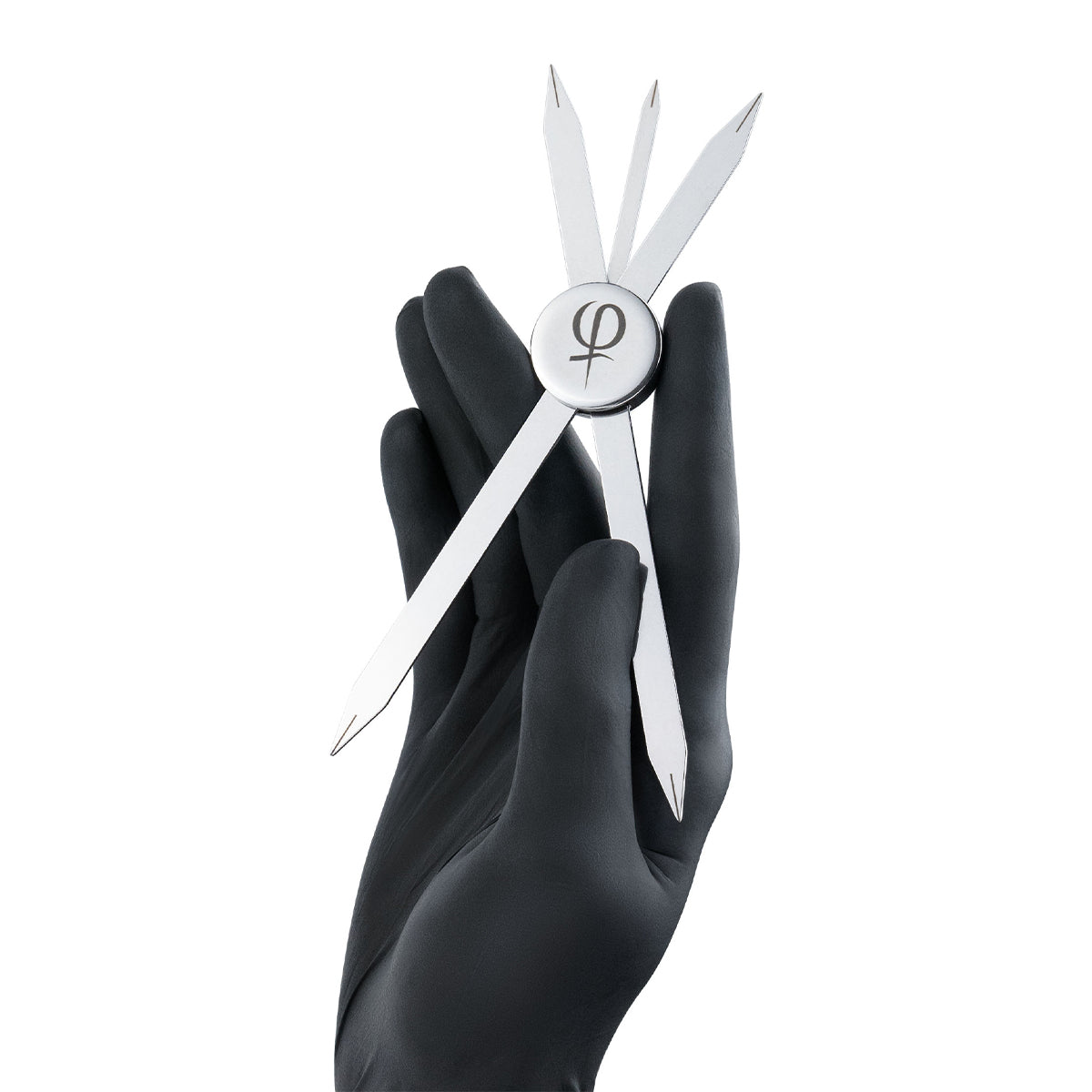 PhiAcademy BB Compass Brow & Lip Mapping Tool — BB Compass held in a gloved hand