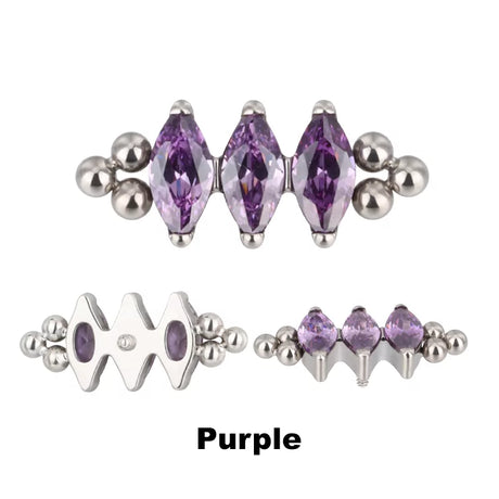 Anello in titanio con tre perline e castone