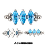 Anello in titanio con tre perline e castone